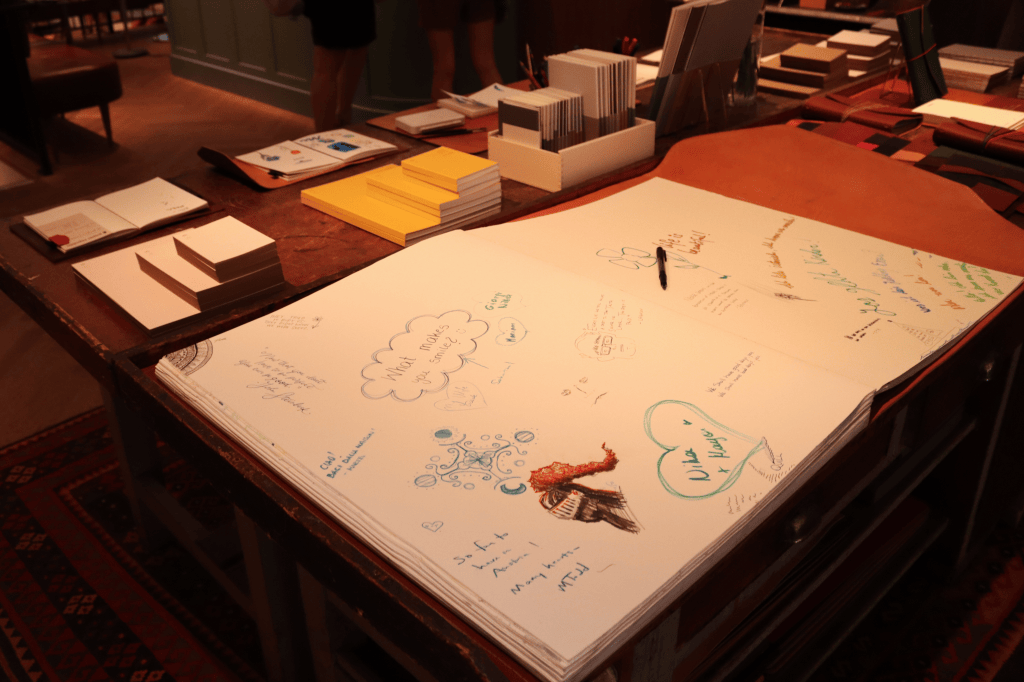 Huge paper republic notebook with drawings and text from la maison visitors.